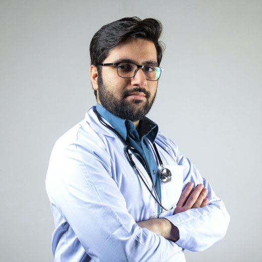 Portrait of Dr. Wahid-ur-Rehman in a white coat with a stethoscope