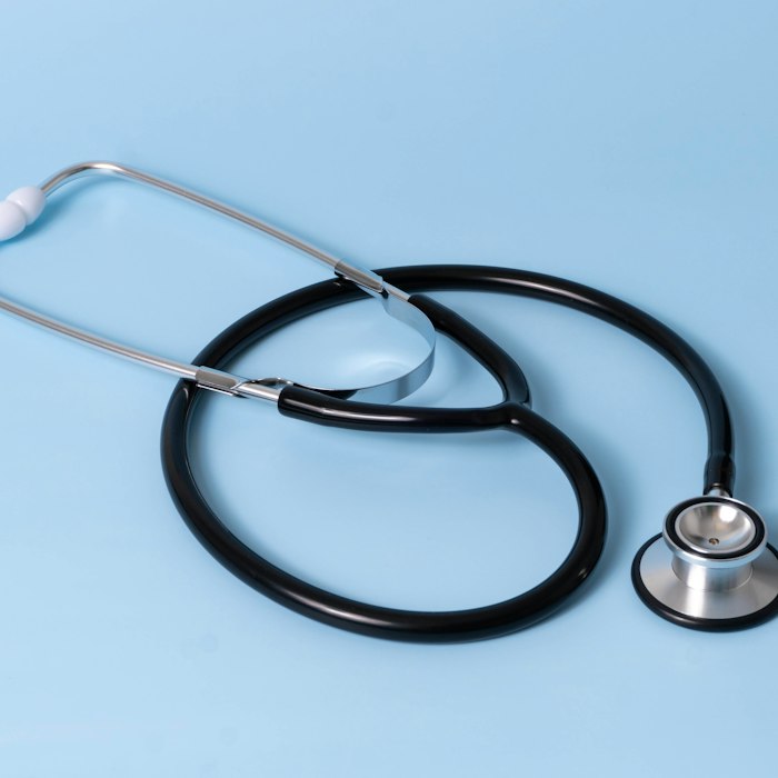 Stethoscope on a light blue background